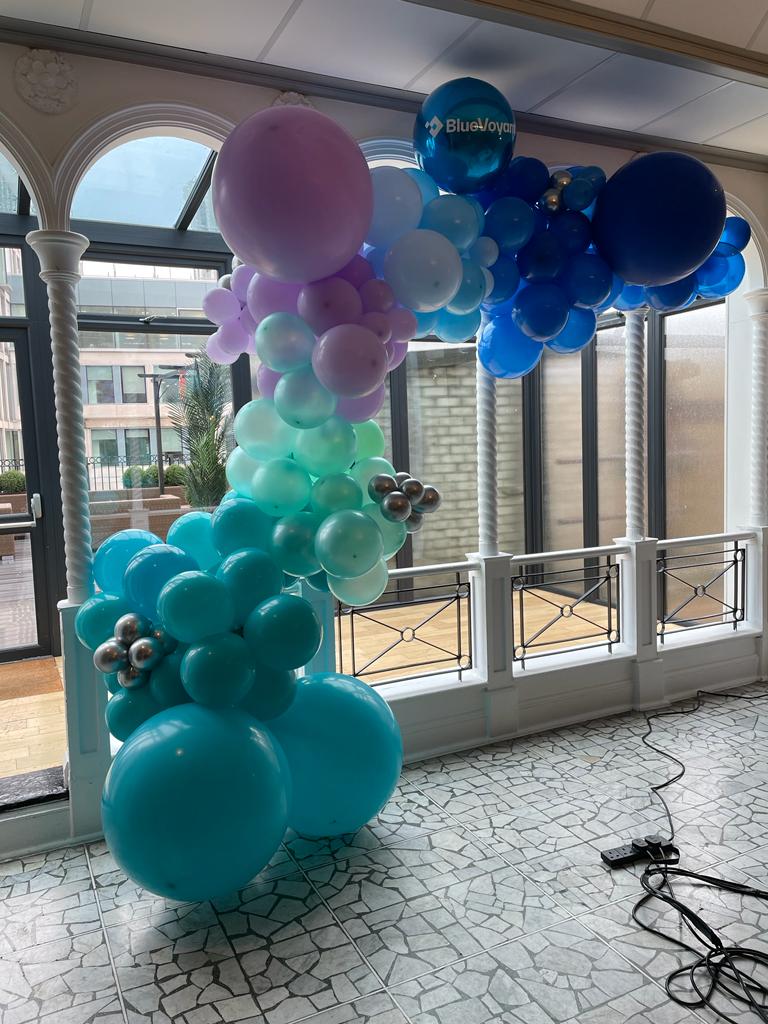 Teal, Blue and Purple organic balloon garland corporate installation