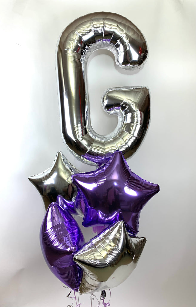 Foil Letter G and balloon cluster