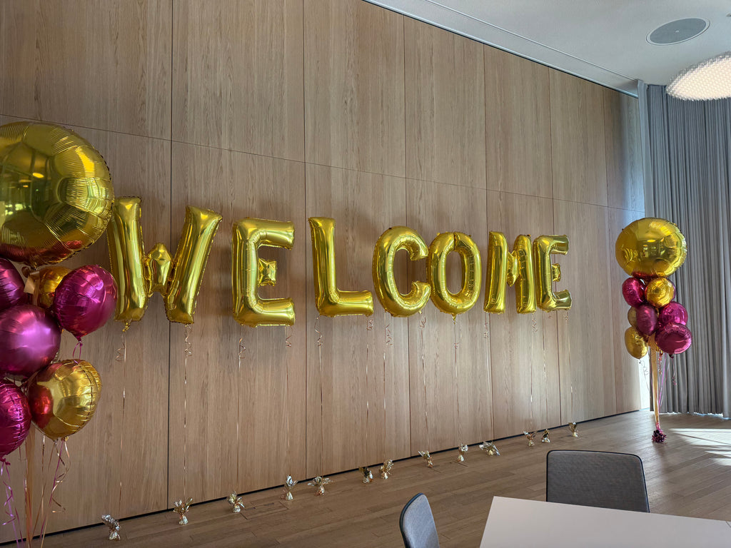 Corporate WELCOME in helium balloon letters