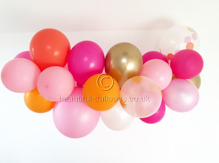 Flamingo Gold Cloud Garland with confetti and pineapple balloons