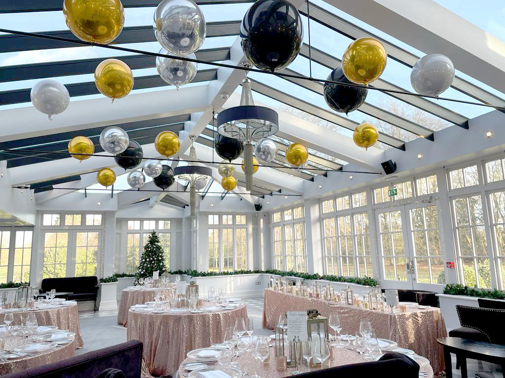 Gold, Silver and Black Orb Ceiling Installation